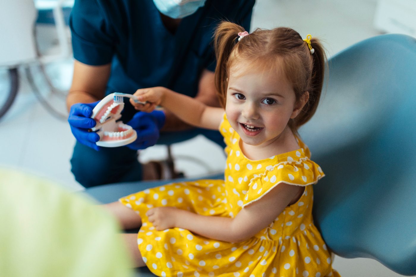 Child smiling at the dentist